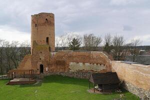Czersk, Poland - March 24th, 2024 - Castle of Masovian Dukes - tower, defensive wall and courtyard photo