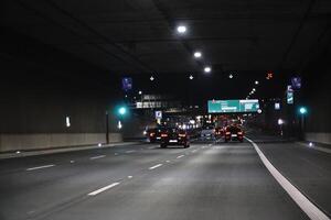 Warsaw, Poland - March 10th, 2024 - Driving a Car in Ursynow Tunnel photo