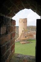 Czersk, Poland - March 24th, 2024 - View at Tower through the Window - Masovian Dukes Castle photo