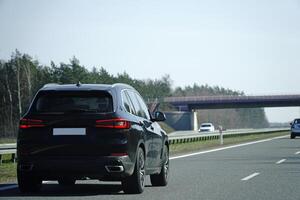 Car Drives on a Highway photo