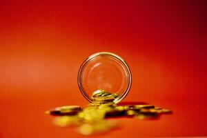 coins on red background photo