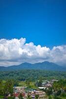 Aerial Mountain of tidar and Village with cloudy blue sky photo