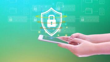 Computer network protection, secure and safe your data concept, businessman holding shield protection icon on smartphone, Security shield Lock Security Business Protect Concept. photo