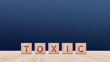 Toxic concept, Cubes wooden blocks form the word Toxic. extensive Toxic Concept applies to both relationships and the chemical industry. photo