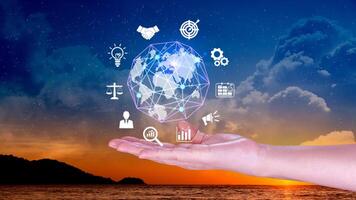 Hand holding virtual Global Internet connection metaverse, Business global internet connection application technology and digital marketing, Financial and banking, Digital link tech, big data. photo