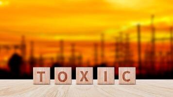 Toxic concept, Cubes wooden blocks form the word Toxic. extensive Toxic Concept applies to both relationships and the chemical industry. photo