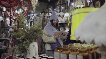 girl reading a book in a store video