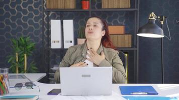 Business woman shrinking and depressed at work. video