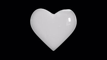 Making Heart Shape With Pure Milk On Black Background video