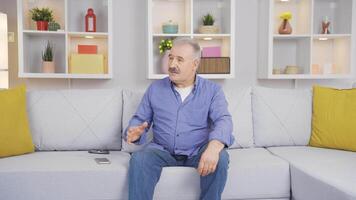 Alone and sad old man at home. video