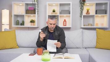 The old man reading the prospectus. video