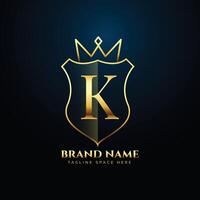 modern golden initial letter K logo background with crown design vector