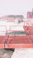 snow around building of polar station in Antarctica video