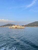 Ship sailing towards Istanbul past the Princes' Islands, Turkey photo