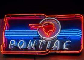 Clarkesville, Georgia USA - September 12, 2020 Vintage Pontiac automotive neon sign photo