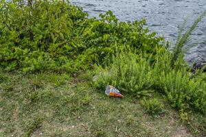 Garbage discarded on the ground photo