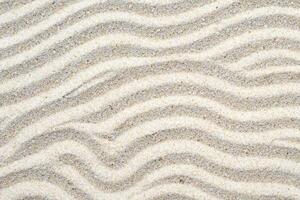 playa de serenidad abrazando el belleza de natural motivo playa, un tranquilo tapiz de la tierra patrones foto