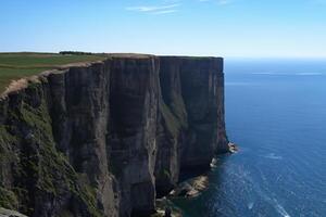 Seaside Majesty Breathtaking Coastal Cliffs Meet Stunning Blue Sea, A Spectacle of Nature's Grandeur photo