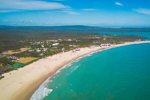 Aerial Perspective Captures Beautiful Beach Sand from Above and High, A Tranquil Vista of Coastal Bliss photo