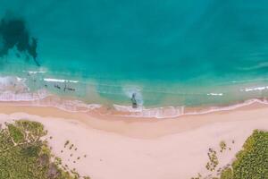 Aerial Perspective Captures Beautiful Beach Sand from Above and High, A Tranquil Vista of Coastal Bliss photo