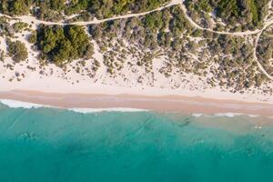 Aerial Perspective Captures Beautiful Beach Sand from Above and High, A Tranquil Vista of Coastal Bliss photo