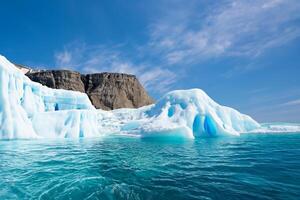 Majestic Ice Cliffs Crowned by a Cool Atmosphere, Framed by the Beautiful Sea and Sky, Conjuring a Harmonious Panorama of Nature's Icy Grandeur and Oceanic Splendor photo