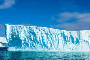 Majestic Ice Cliffs Crowned by a Cool Atmosphere, Framed by the Beautiful Sea and Sky, Conjuring a Harmonious Panorama of Nature's Icy Grandeur and Oceanic Splendor photo