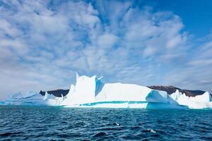 Majestic Ice Cliffs Crowned by a Cool Atmosphere, Framed by the Beautiful Sea and Sky, Conjuring a Harmonious Panorama of Nature's Icy Grandeur and Oceanic Splendor photo