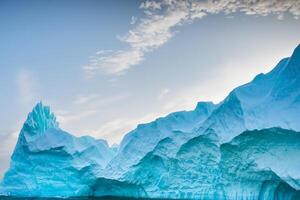 Majestic Ice Cliffs Crowned by a Cool Atmosphere, Framed by the Beautiful Sea and Sky, Conjuring a Harmonious Panorama of Nature's Icy Grandeur and Oceanic Splendor photo