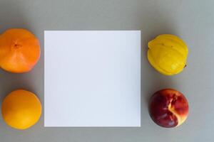 Card and White Paper Mockup Harmonized with Fresh Fruit, Crafting a Visual Symphony of Artful Design and Culinary Delight, Where Wholesome Ingredients Merge in a Feast of Vibrant Imagery photo