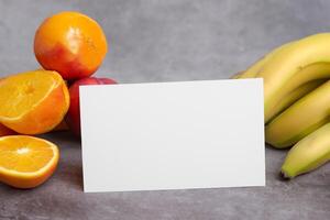 Card and White Paper Mockup Harmonized with Fresh Fruit, Crafting a Visual Symphony of Artful Design and Culinary Delight, Where Wholesome Ingredients Merge in a Feast of Vibrant Imagery photo