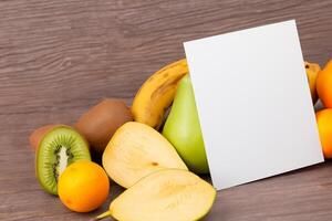 Card and White Paper Mockup Harmonized with Fresh Fruit, Crafting a Visual Symphony of Artful Design and Culinary Delight, Where Wholesome Ingredients Merge in a Feast of Vibrant Imagery photo