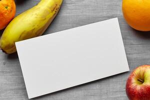 Card and White Paper Mockup Harmonized with Fresh Fruit, Crafting a Visual Symphony of Artful Design and Culinary Delight, Where Wholesome Ingredients Merge in a Feast of Vibrant Imagery photo