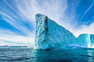 Majestic Ice Cliffs Crowned by a Cool Atmosphere, Framed by the Beautiful Sea and Sky, Conjuring a Harmonious Panorama of Nature's Icy Grandeur and Oceanic Splendor photo