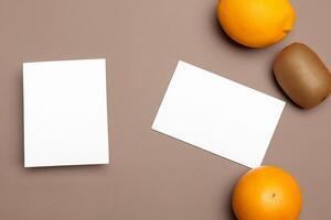 Card and White Paper Mockup Harmonized with Fresh Fruit, Crafting a Visual Symphony of Artful Design and Culinary Delight, Where Wholesome Ingredients Merge in a Feast of Vibrant Imagery photo