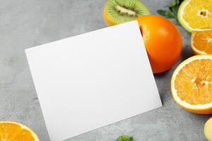 Card and White Paper Mockup Harmonized with Fresh Fruit, Crafting a Visual Symphony of Artful Design and Culinary Delight, Where Wholesome Ingredients Merge in a Feast of Vibrant Imagery photo