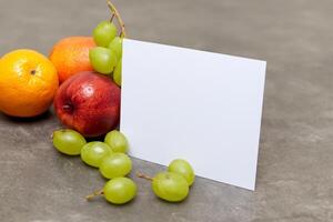 Card and White Paper Mockup Harmonized with Fresh Fruit, Crafting a Visual Symphony of Artful Design and Culinary Delight, Where Wholesome Ingredients Merge in a Feast of Vibrant Imagery photo