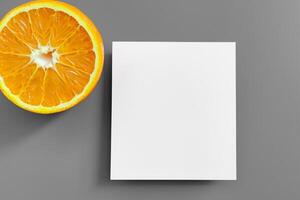 Generated imageWhite Paper Mockup Enlivened by the Zesty Aura of Fresh Oranges, Crafting a Visual Symphony of Culinary Opulence and Wholesome Design photo