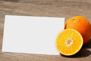 Generated imageWhite Paper Mockup Enlivened by the Zesty Aura of Fresh Oranges, Crafting a Visual Symphony of Culinary Opulence and Wholesome Design photo