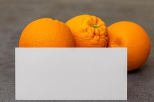 Generated imageWhite Paper Mockup Enlivened by the Zesty Aura of Fresh Oranges, Crafting a Visual Symphony of Culinary Opulence and Wholesome Design photo