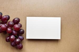 White Paper Mockup Enhanced by the Juicy Allure of Fresh Grapes, Crafting a Visual Symphony of Culinary Elegance and Wholesome Imagery, Where Graphic Design Flourishes in a Feast of Vibrant Creativity photo