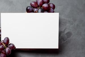 White Paper Mockup Enhanced by the Juicy Allure of Fresh Grapes, Crafting a Visual Symphony of Culinary Elegance and Wholesome Imagery, Where Graphic Design Flourishes in a Feast of Vibrant Creativity photo
