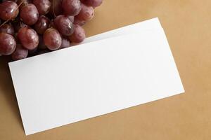 White Paper Mockup Enhanced by the Juicy Allure of Fresh Grapes, Crafting a Visual Symphony of Culinary Elegance and Wholesome Imagery, Where Graphic Design Flourishes in a Feast of Vibrant Creativity photo