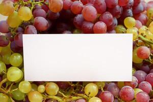 White Paper Mockup Enhanced by the Juicy Allure of Fresh Grapes, Crafting a Visual Symphony of Culinary Elegance and Wholesome Imagery, Where Graphic Design Flourishes in a Feast of Vibrant Creativity photo