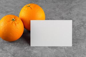 White Paper Mockup Enlivened by the Zesty Aura of Fresh Oranges, Crafting a Visual Symphony of Culinary Opulence and Wholesome Design photo