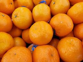 Full frame shot of oranges for sale at market photo