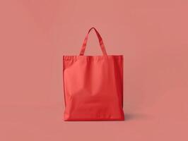 Eco friendly red cotton shopping bag. Isolated on a pink solid background. Studio shooting, mockup photo