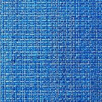 A blue and white woven fabric with a blue background photo