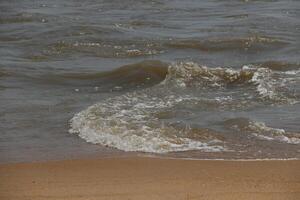 waves at the beach of grand popo photo