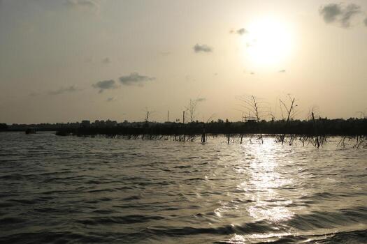 suset terminado lago nokoue foto